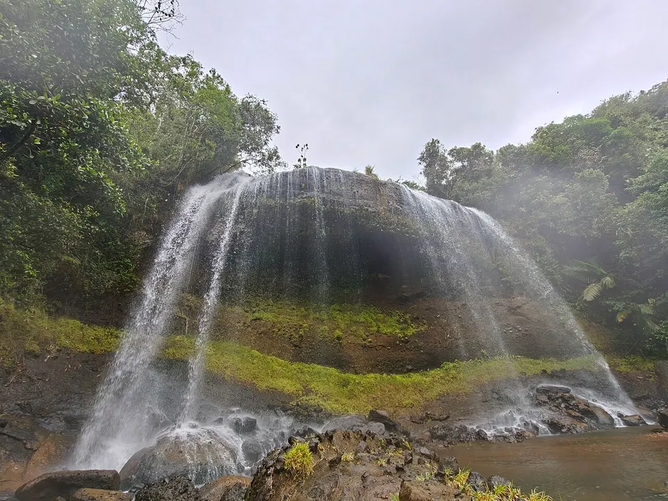 Waterfall surrounded by tropical vegetation — Ngardmau, Palau