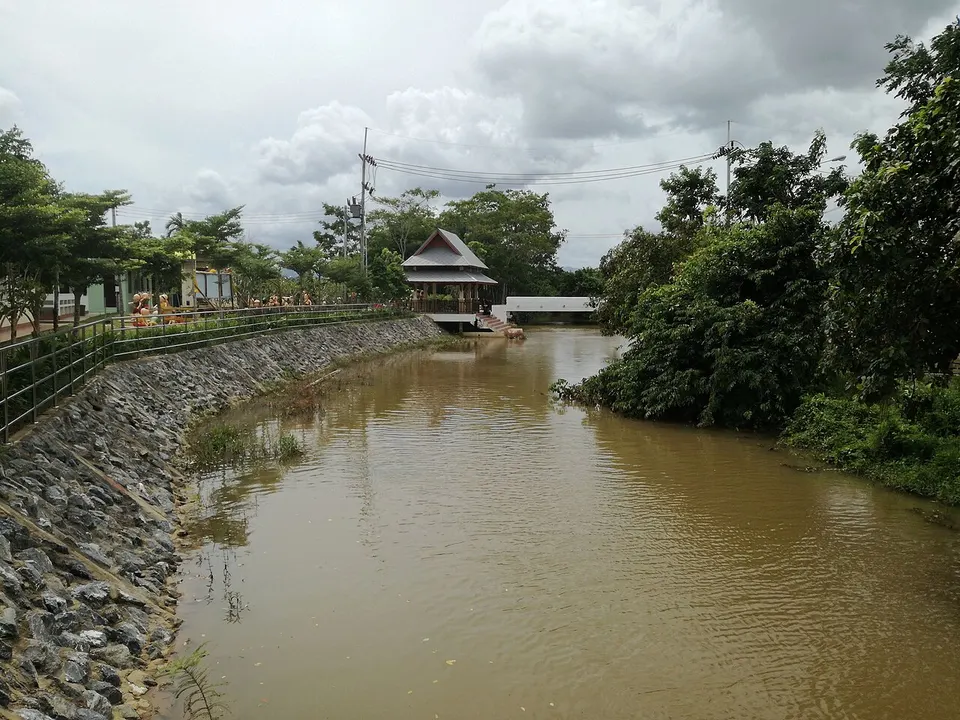 River and wooded shoreline — Trang Province, Thailand