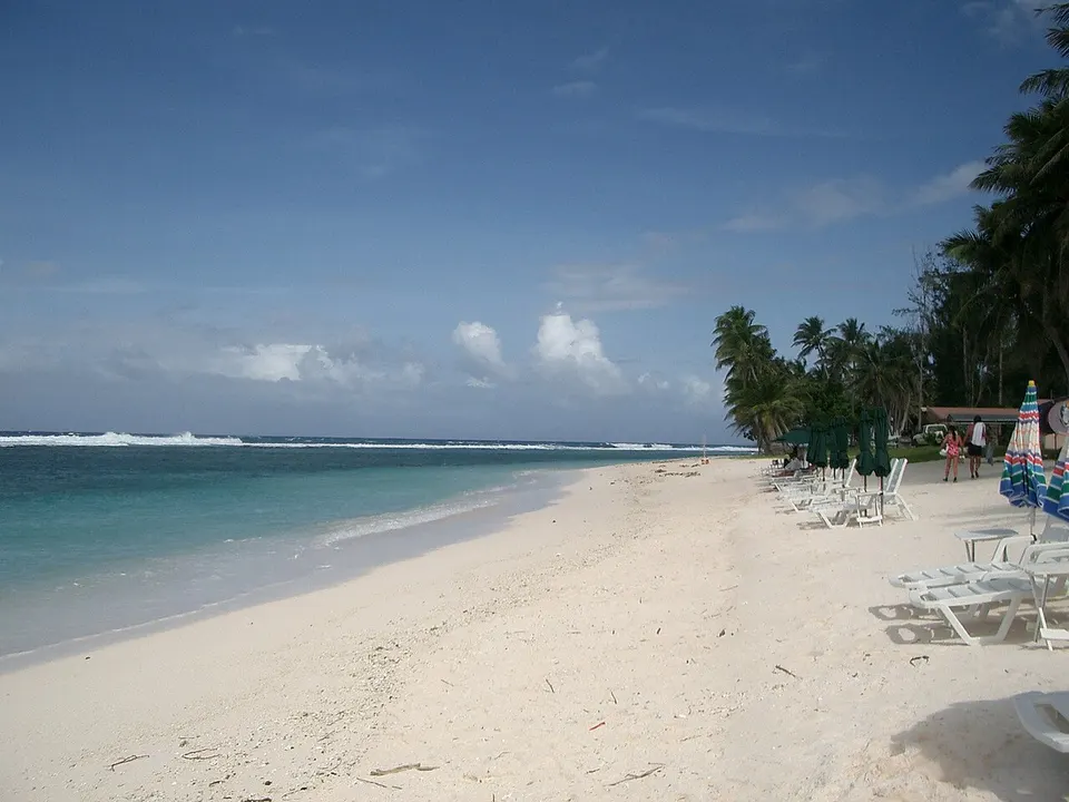 Sandy beach and palm trees — Rota, Northern Mariana Islands