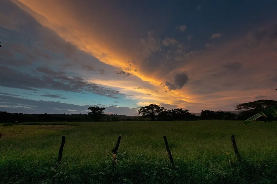 Grassland beneath a dramatic sky — Shefa Province, Vanuatu