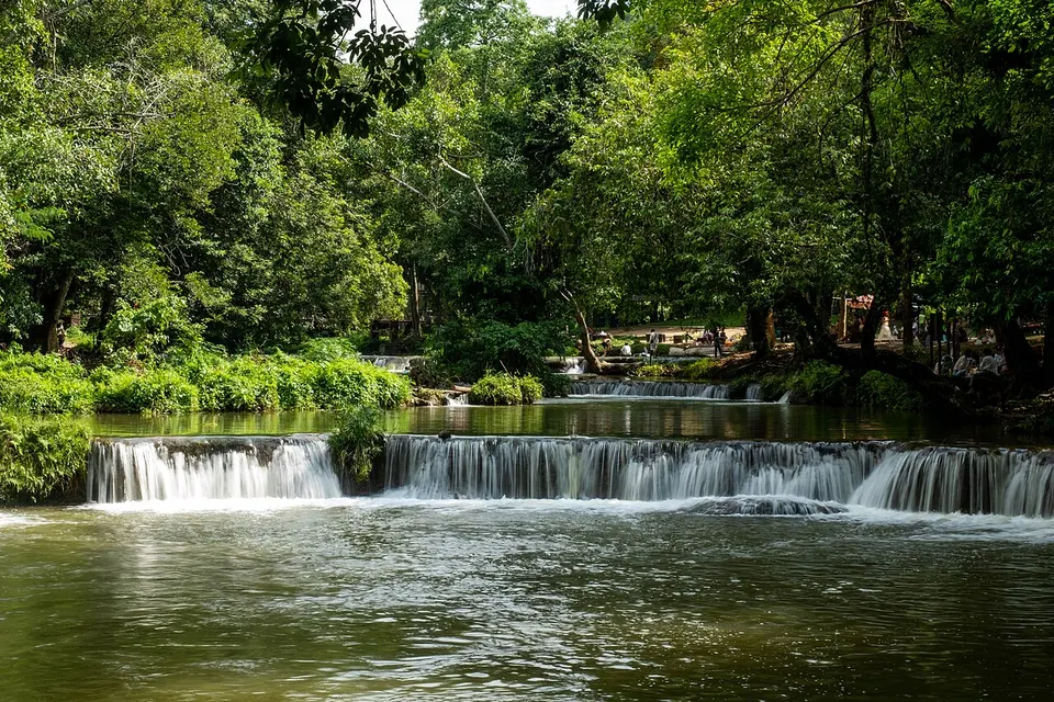 River weir surrounded by trees — Saraburi Province, Thailand