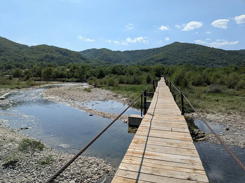 Walking bridge across a river — PRAHOVA, Romania