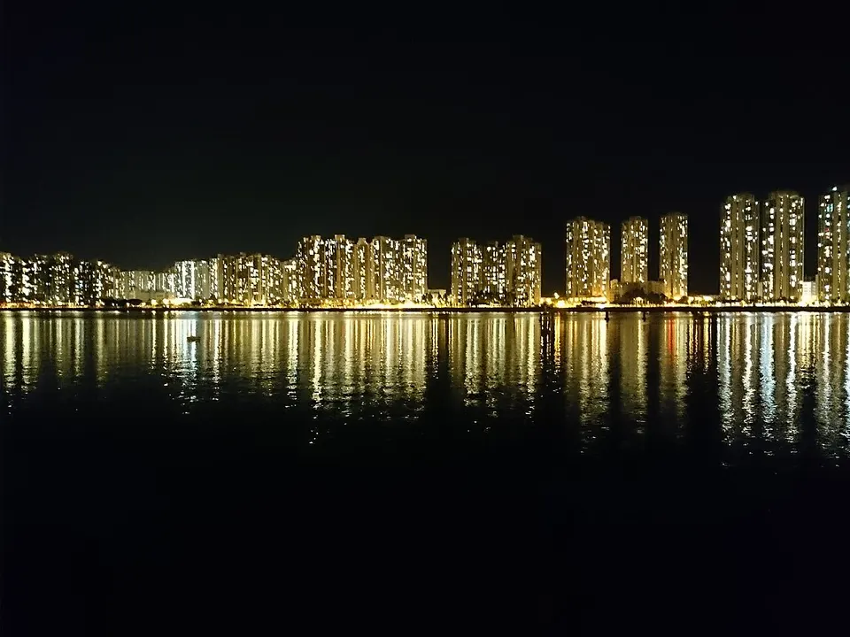 Waterfront skyline at night — Tai Po, Hong Kong