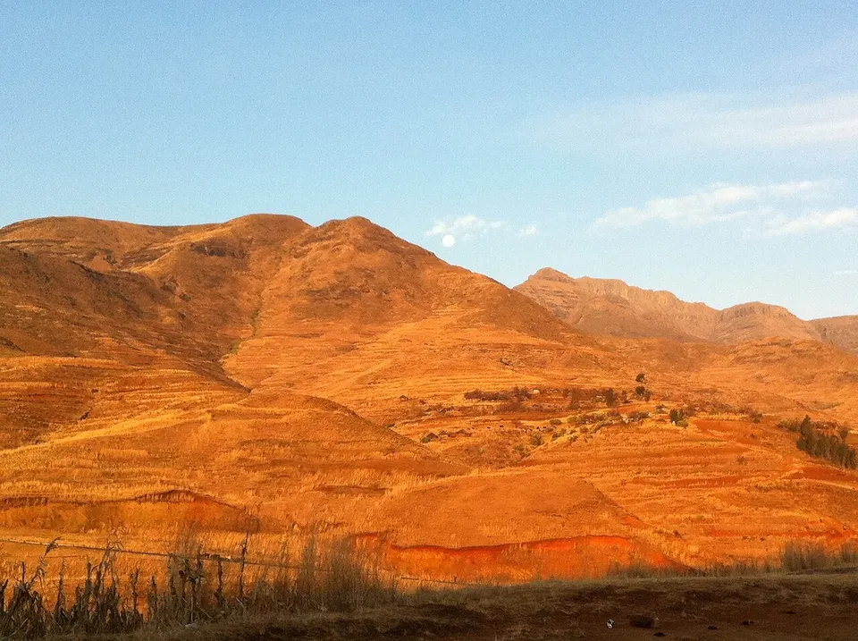 Rugged orange mountain slopes — Butha-Buthe District, Lesotho