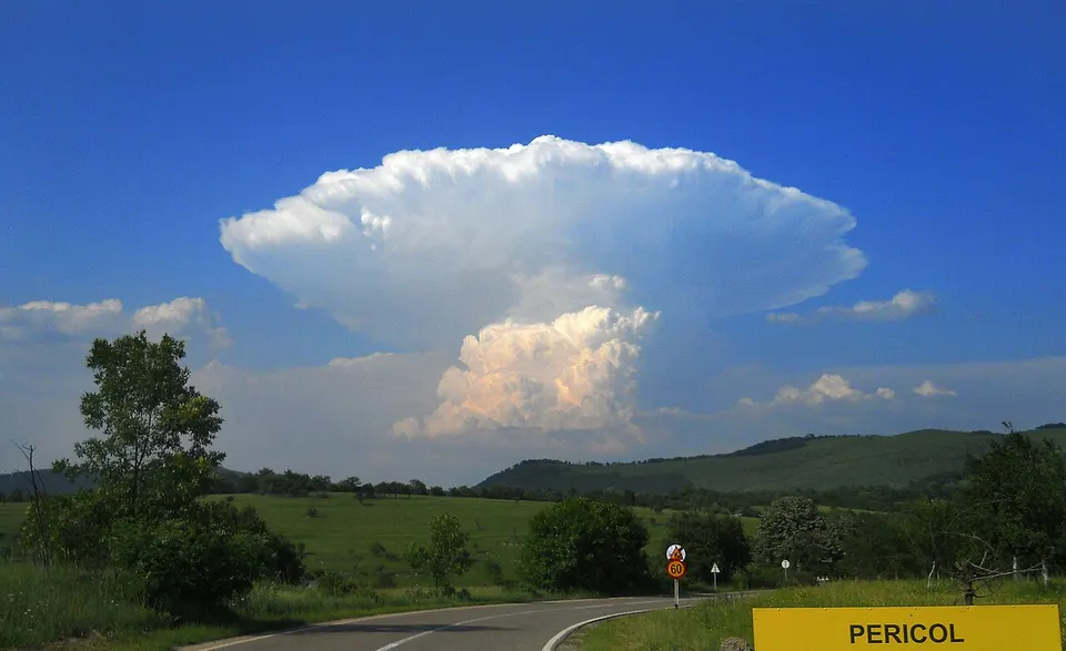 Green hills beneath a dramatic sky — CARAS-SEVERIN, Romania