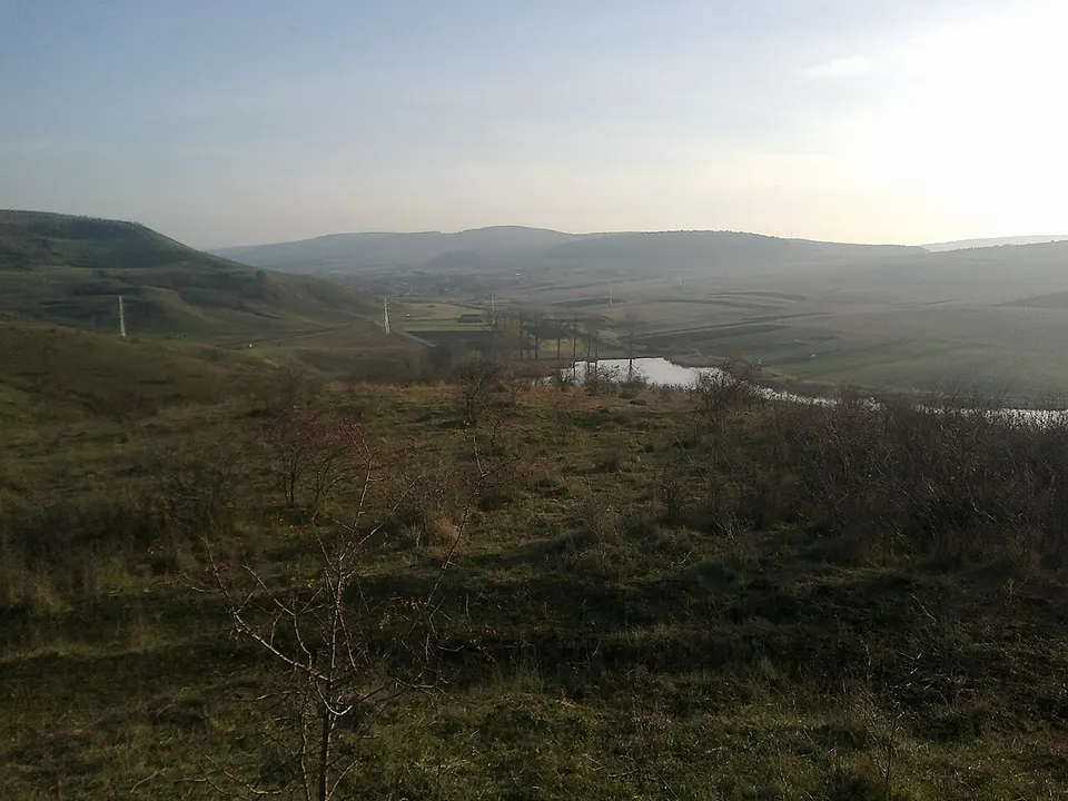 Open hills and distant water — CLUJ, Romania