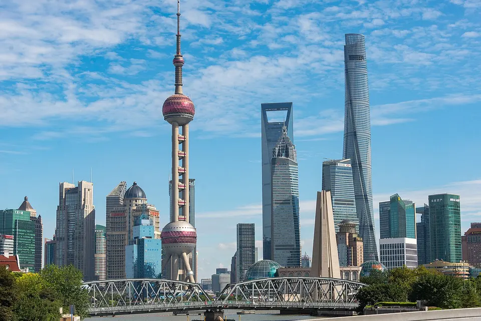 City skyline beside a river — Shanghai Municipality, China