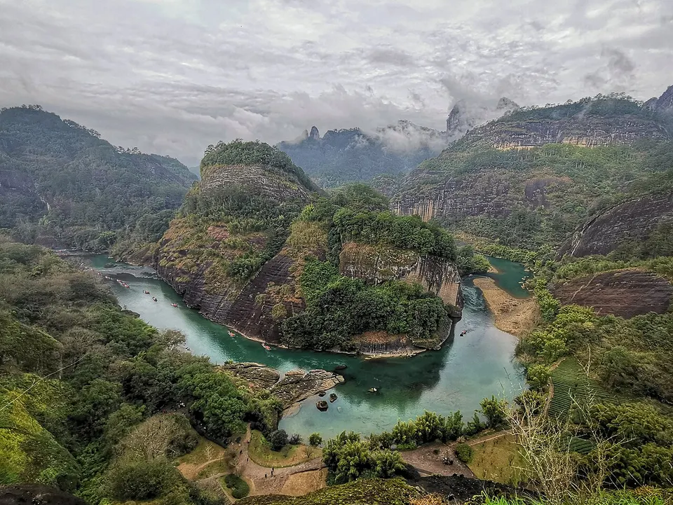 River winding through wooded mountains — Fujian Province, China