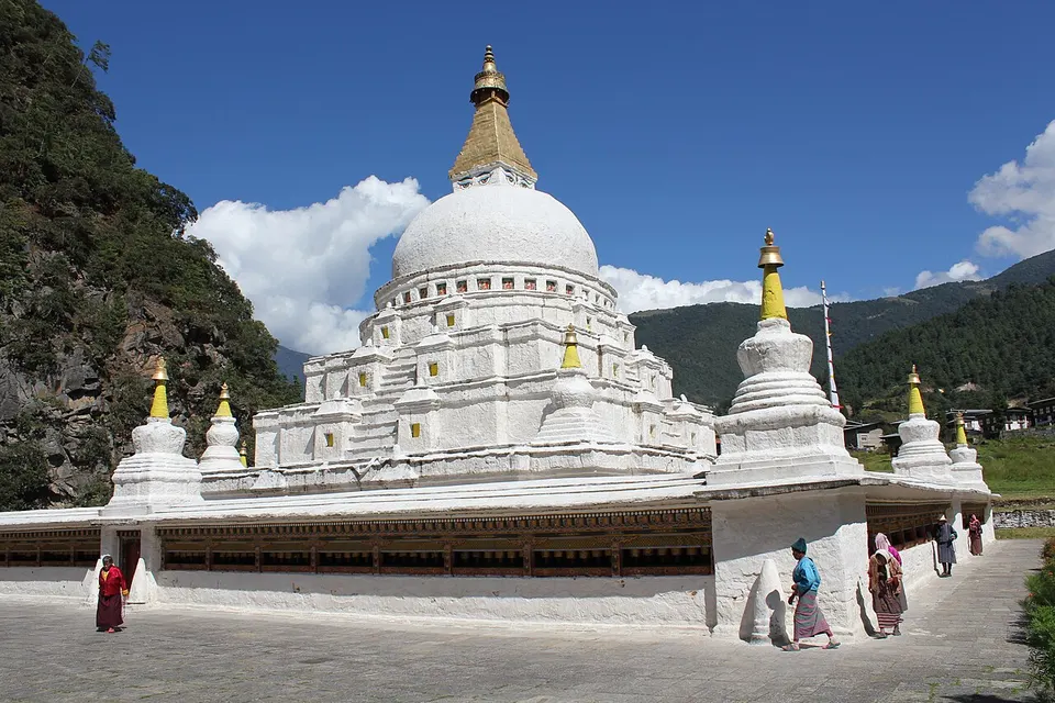 White stupa and mountain landscape — Trashiyangtse, Bhutan