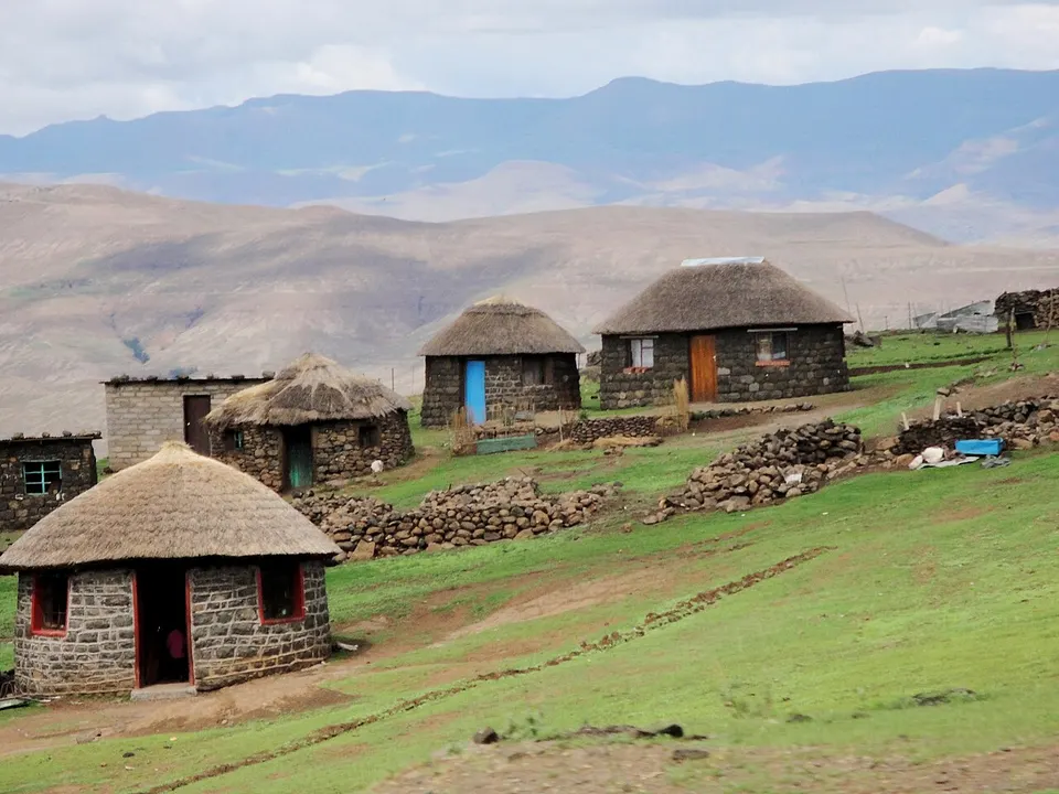 Stone houses in a green mountain landscape — Mokhotlong District, Lesotho
