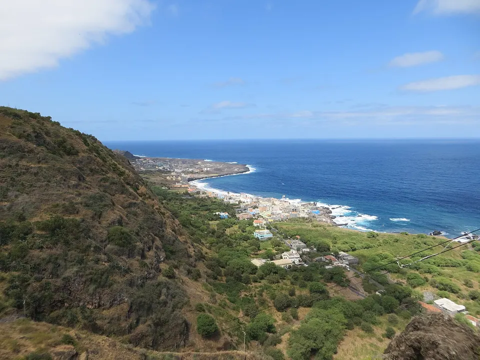 Green hillside and coastal town — Mosteiros, Cabo Verde