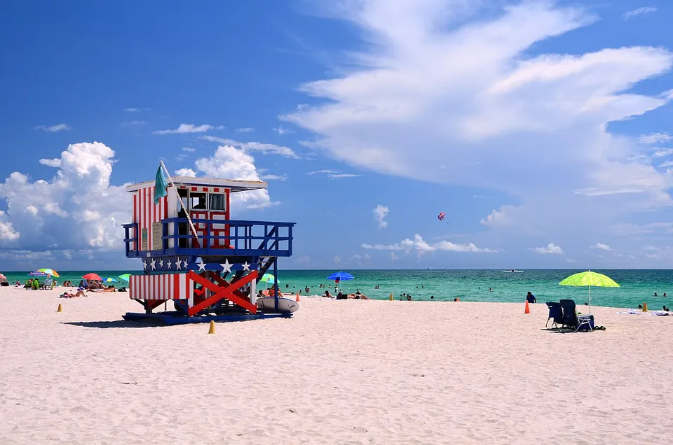 Sandy beach beneath a blue sky — Miami-Dade, United States