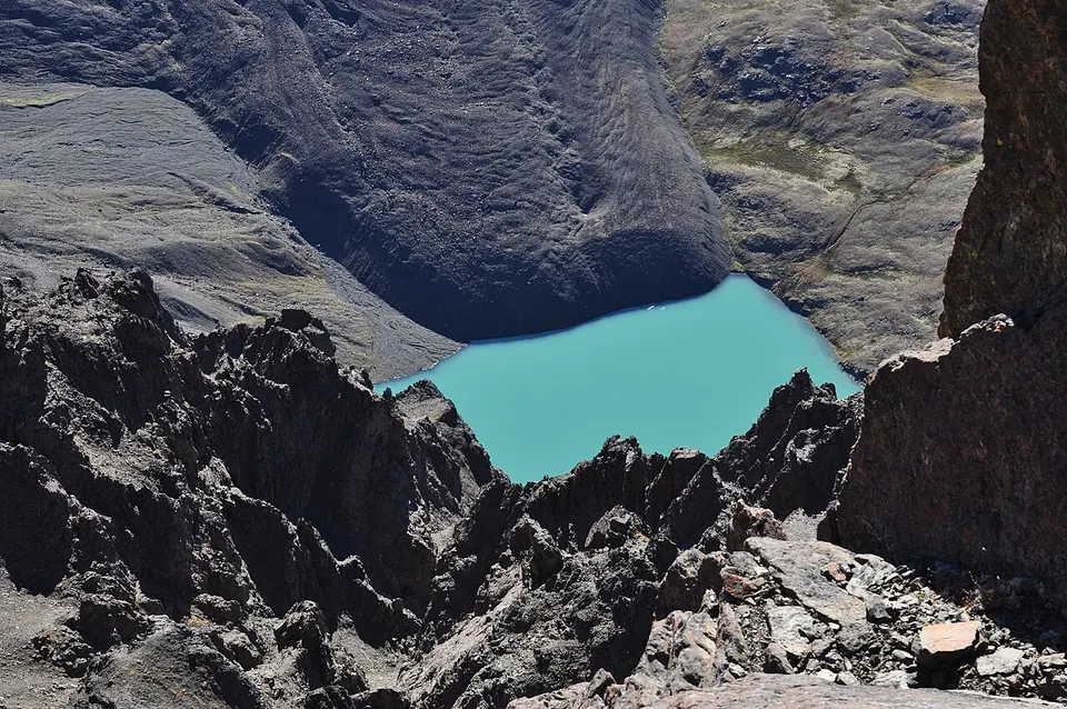Mirror Lake and rock glacier below Cantata Peak — Anchorage, United States